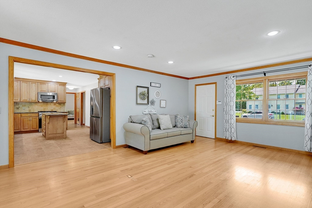 5 Evergreen Circle Wilbraham, MA 01095 - Photo 8 of 39 a living room with furniture and large windows