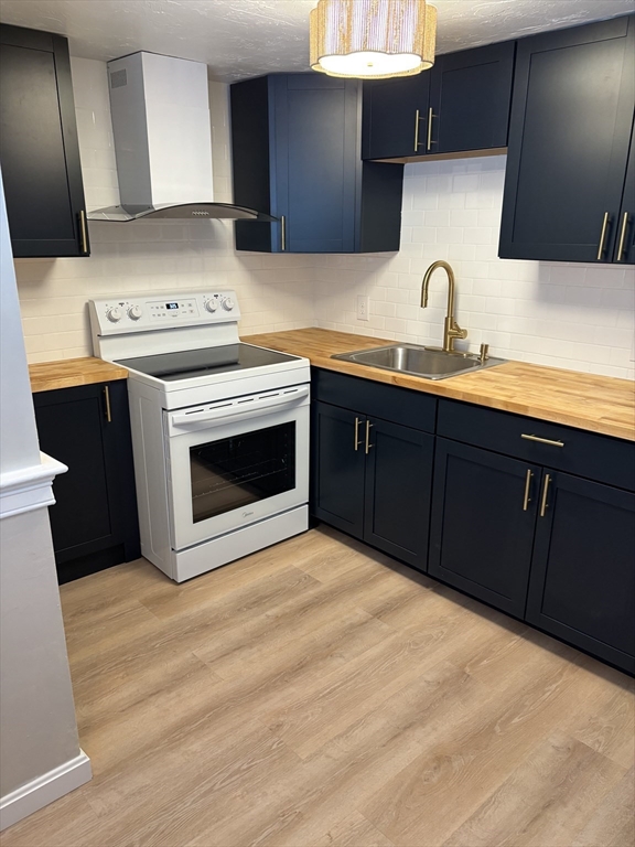 2 Tideview Path, Unit 8 Plymouth, MA 02360 - Photo 1 of 16 a kitchen with a sink cabinets and appliances