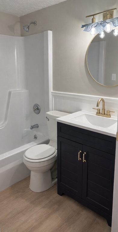 2 Tideview Path, Unit 8 Plymouth, MA 02360 - Photo 14 of 16 a bathroom with a sink a toilet and mirror