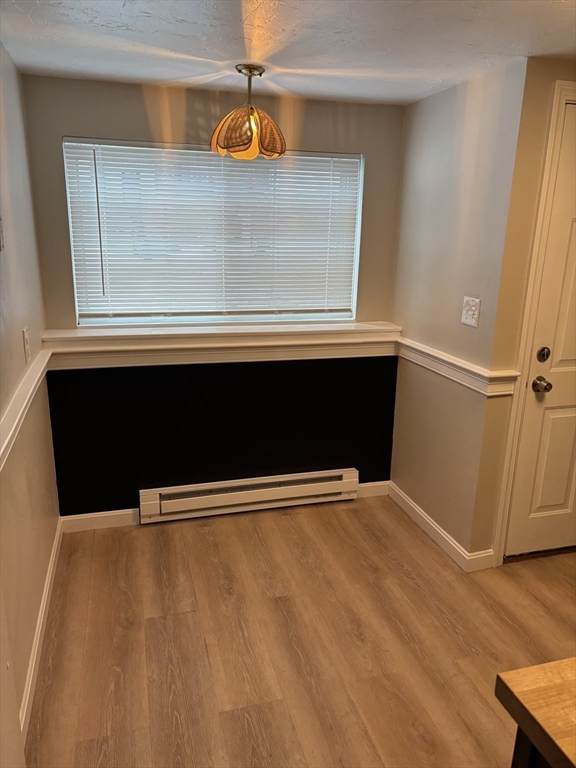 2 Tideview Path, Unit 8 Plymouth, MA 02360 - Photo 4 of 16 a view of kitchen with a sink and wooden floor