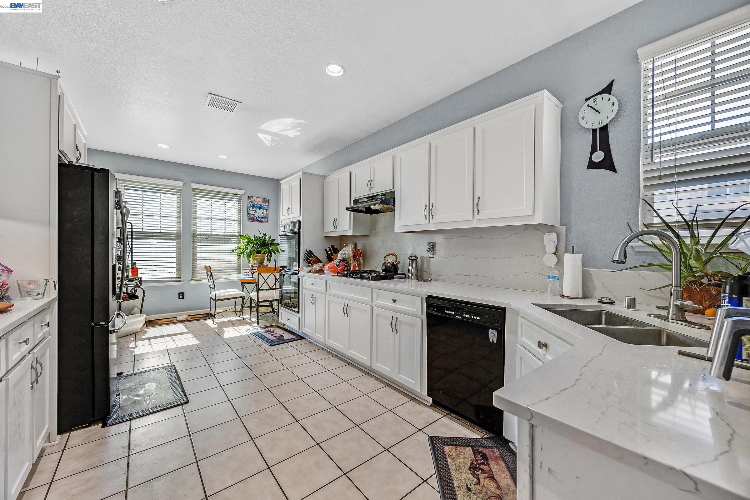 11 Fallen Leaf Court Rodeo, CA 94572 - Photo 5 of 6 a kitchen with a sink cabinets and window