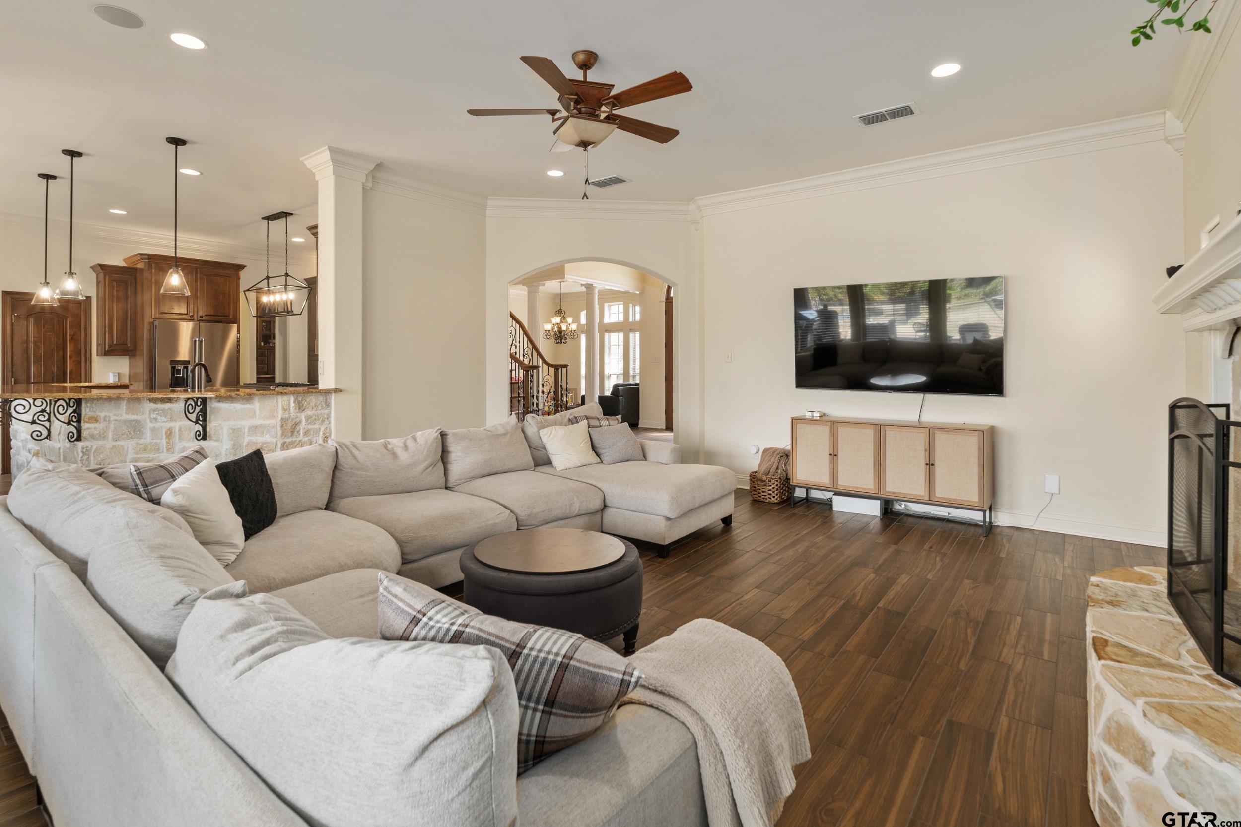 1509 Cooks Crossing Tyler, TX 75703 - Photo 12 of 48 a living room with furniture and a flat screen tv