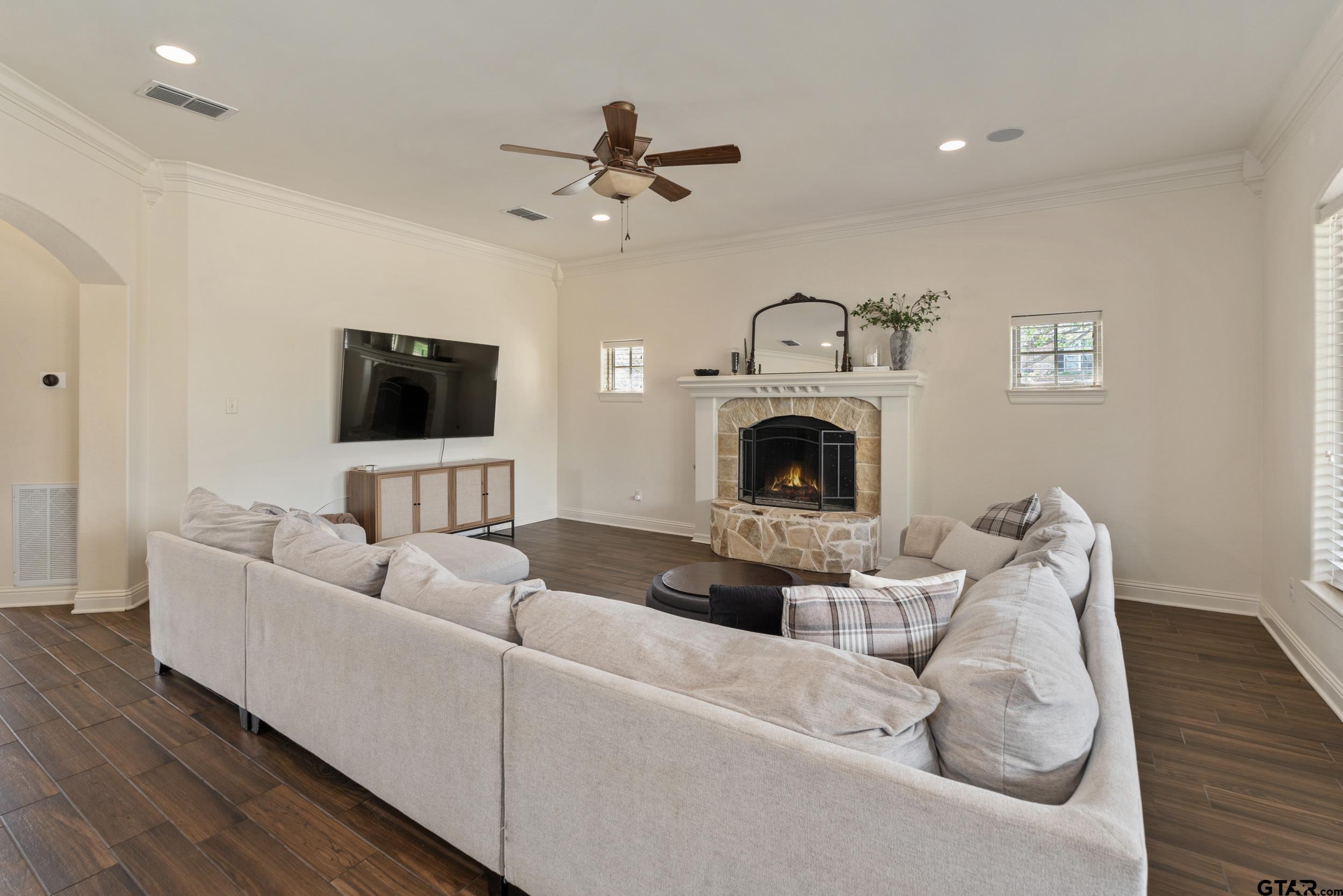 1509 Cooks Crossing Tyler, TX 75703 - Photo 13 of 48 a living room with furniture and a flat screen tv