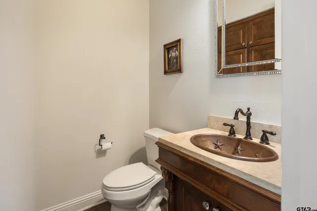 a bathroom with a sink and a toilet