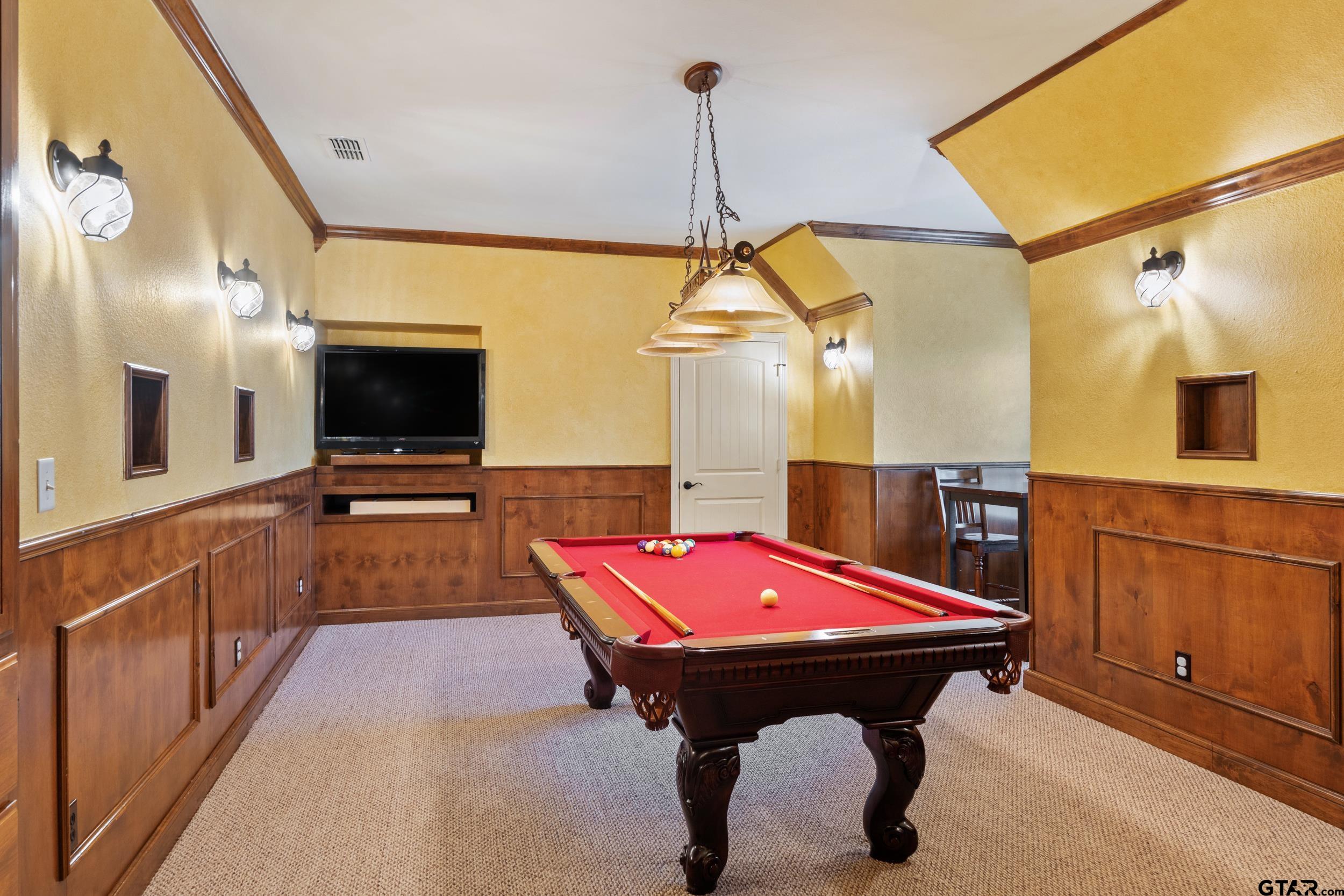 1509 Cooks Crossing Tyler, TX 75703 - Photo 36 of 48 a kitchen with stainless steel appliances dining table and chairs