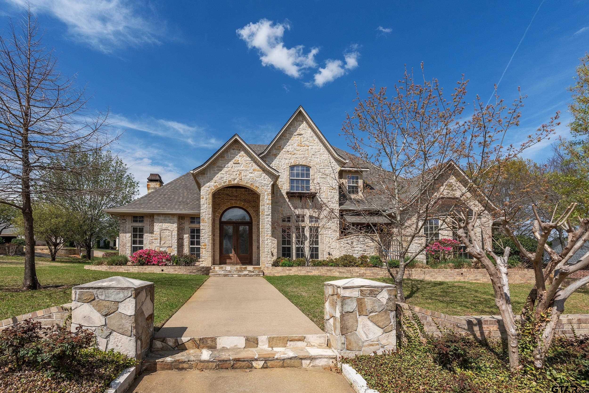1509 Cooks Crossing Tyler, TX 75703 - Photo 4 of 48 a front view of a house with a yard