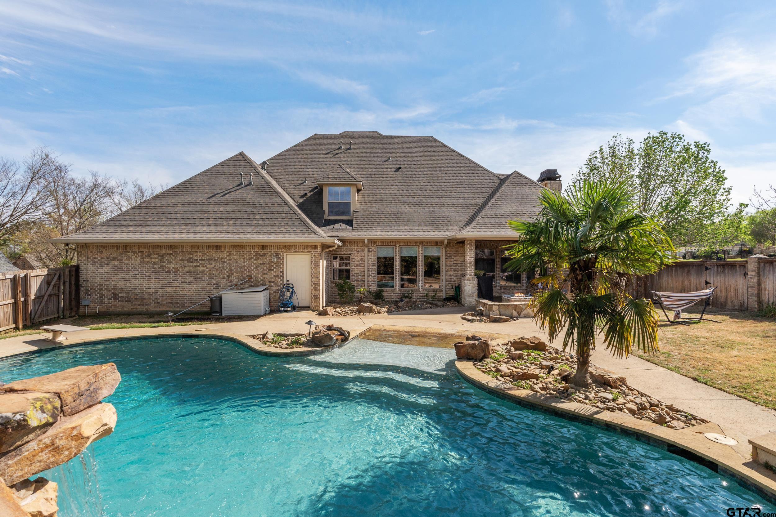 1509 Cooks Crossing Tyler, TX 75703 - Photo 46 of 48 a front view of a house with garden