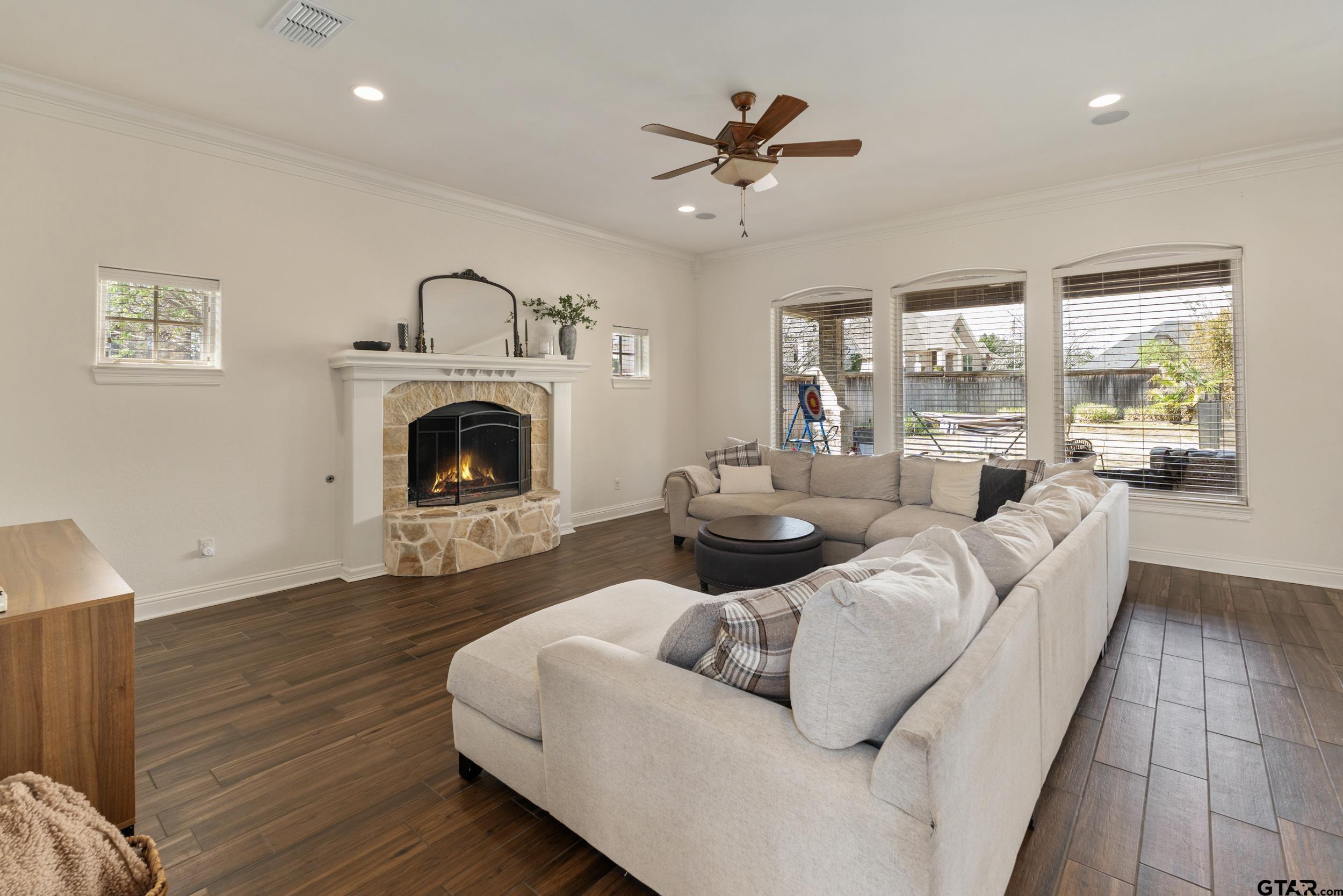1509 Cooks Crossing Tyler, TX 75703 - Photo 10 of 48 a living room with furniture and a fireplace