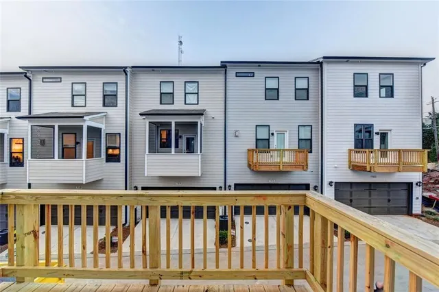 a view of a brick building from a balcony