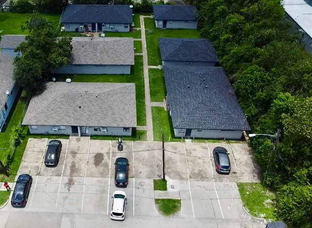 an aerial view of a house with garden