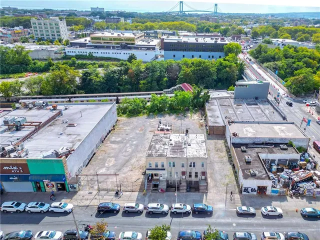 an aerial view of a city with lots of residential buildings