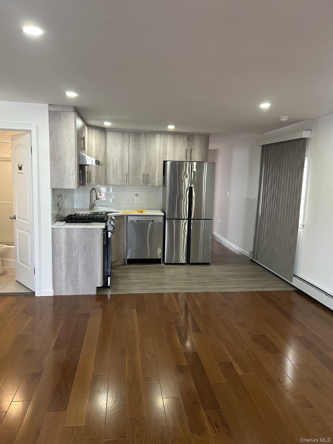 91-08 77th Street Queens, NY 11421 - Photo 4 of 20 1st Floor Living Room/Kitchen