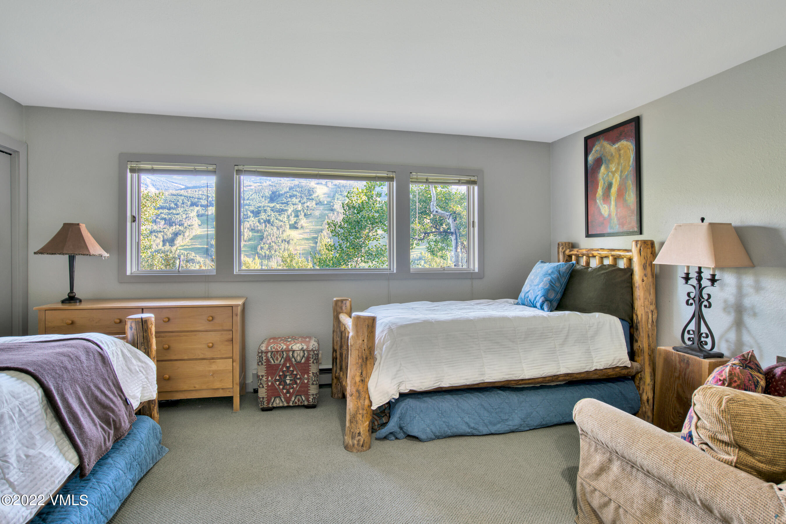 770 Potato Patch Drive, Unit 6 Vail, CO 81657 - Photo 23 of 28 a bedroom with two beds and window