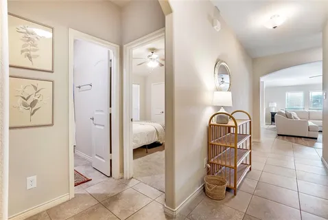 a view of a livingroom with furniture and front door