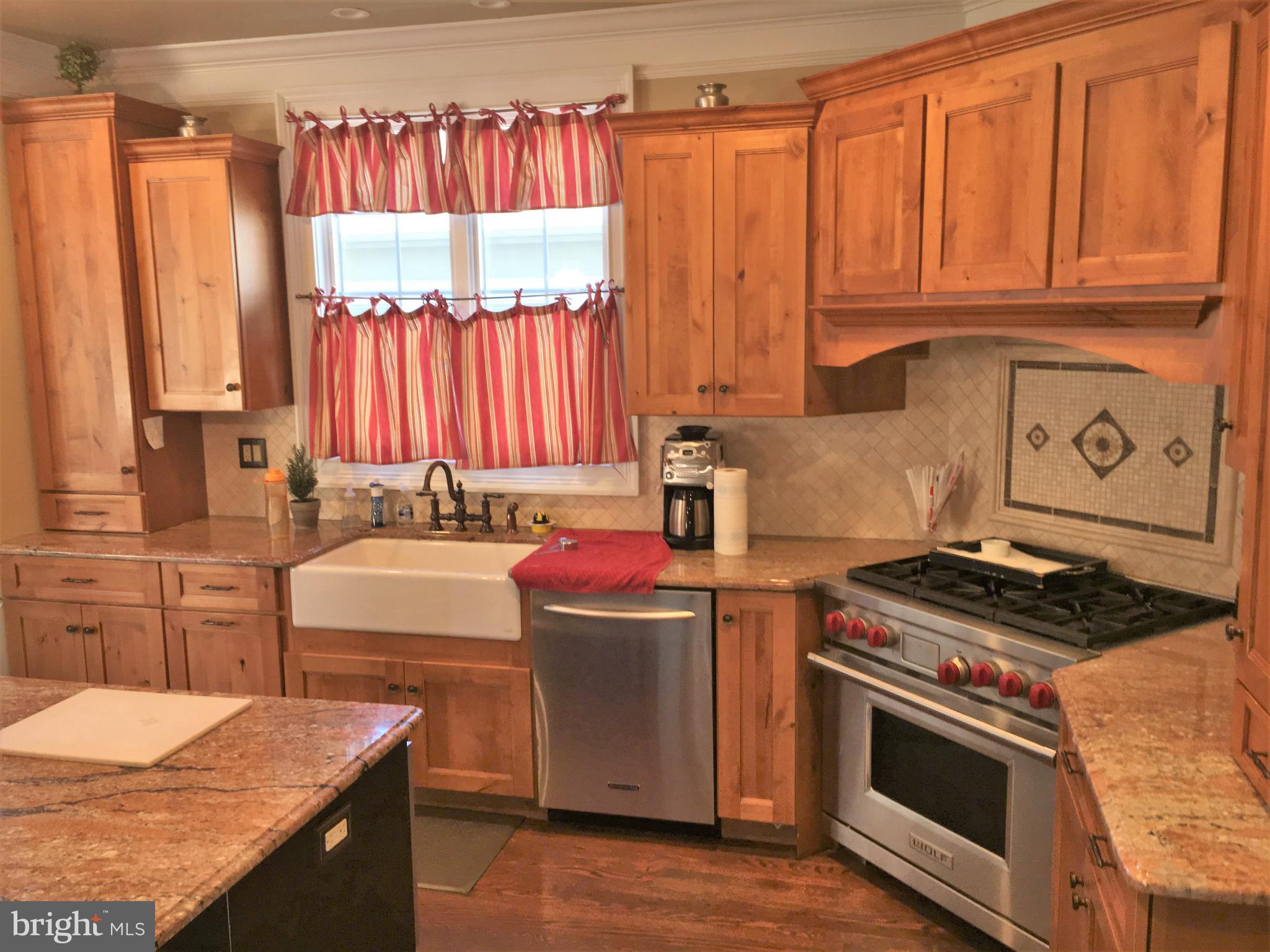 1616 Copper Beech Road Huntingdon Valley, PA 19006 - Photo 14 of 26 Kitchen-Wolf gas range and Sub Zero refrigerator.