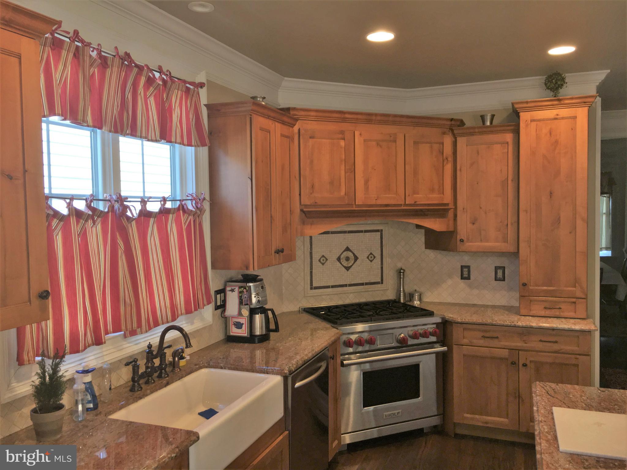1616 Copper Beech Road Huntingdon Valley, PA 19006 - Photo 16 of 26 Kitchen-Wolf gas range and Sub Zero refrigerator.