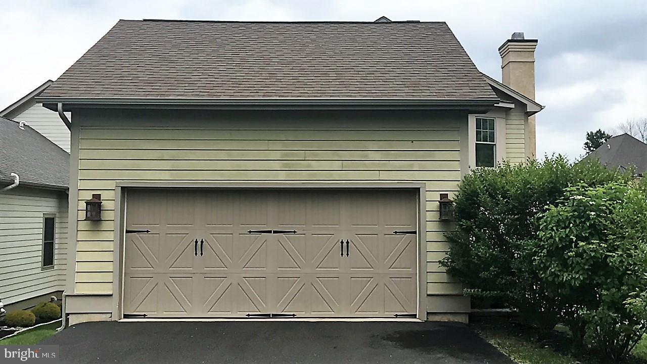 1616 Copper Beech Road Huntingdon Valley, PA 19006 - Photo 6 of 26 Detached garage, summer scene.