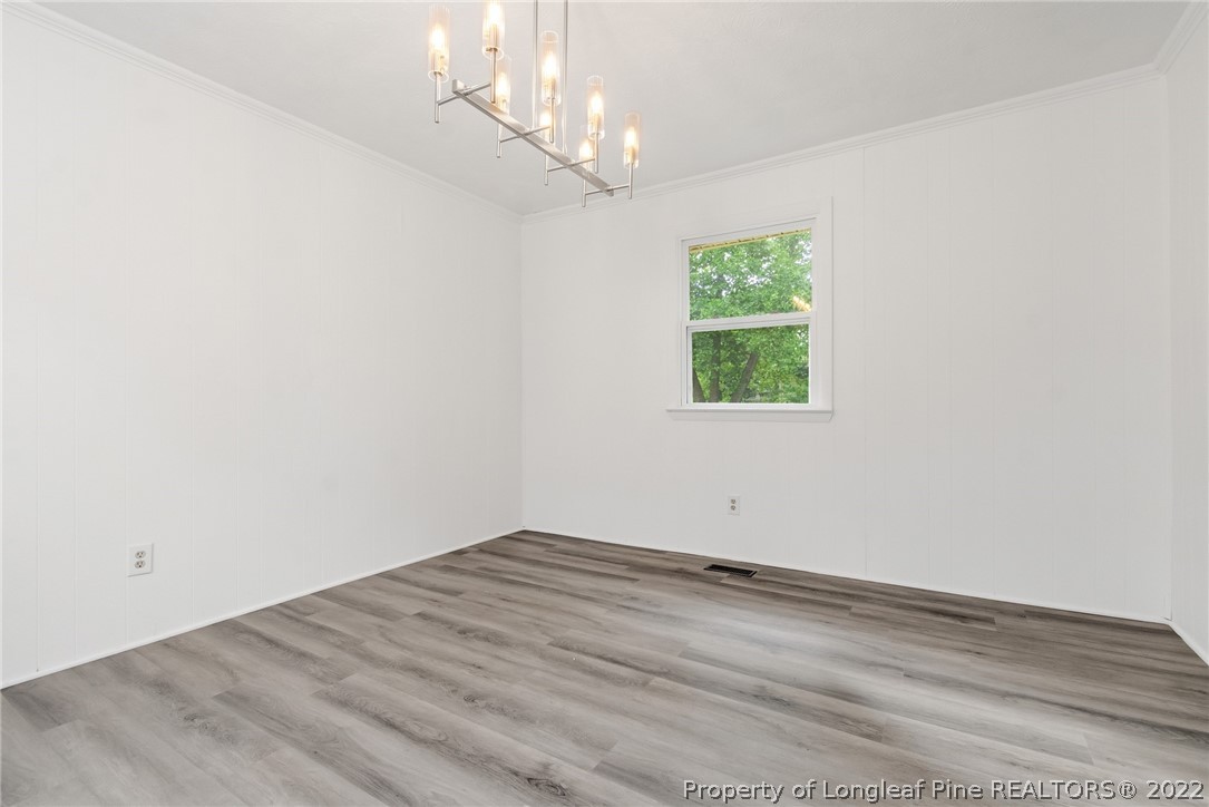 77 Hiawatha Road Pembroke, NC 28372 - Photo 12 of 30 a view of a room with a window and a ceiling fan