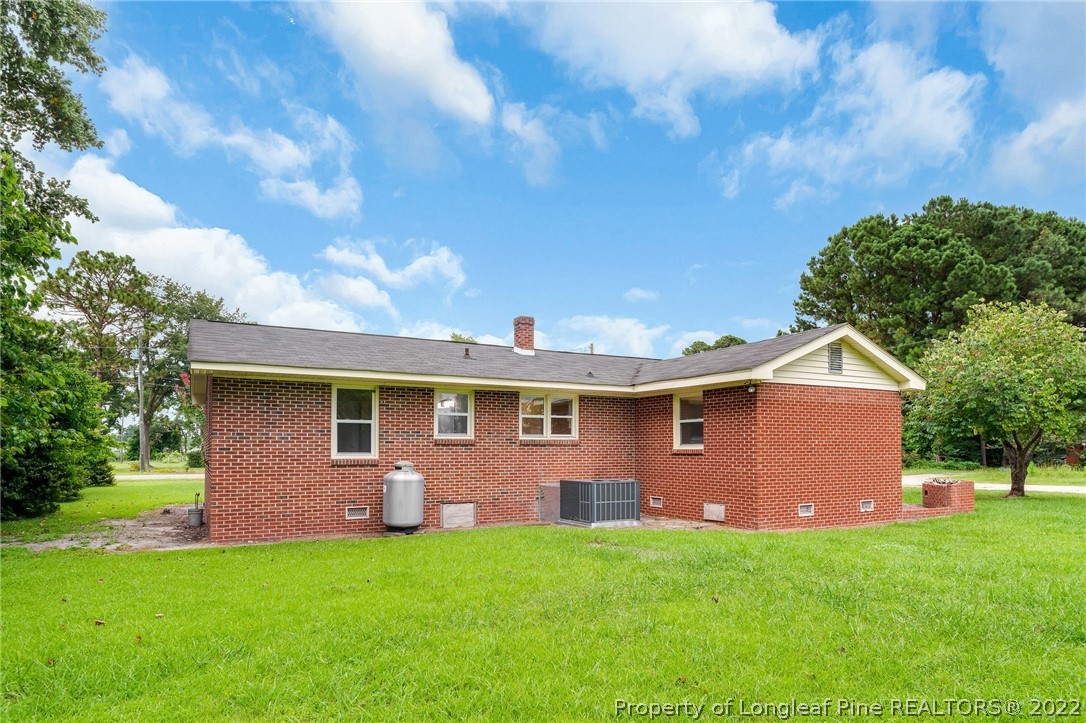 77 Hiawatha Road Pembroke, NC 28372 - Photo 29 of 30 a front view of a house with a garden