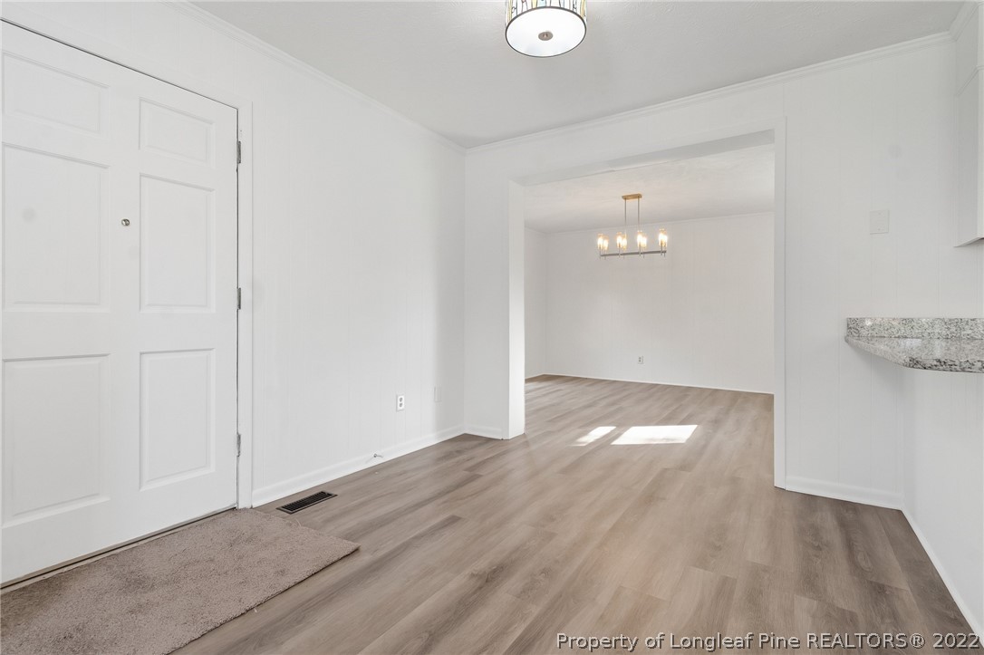 77 Hiawatha Road Pembroke, NC 28372 - Photo 10 of 30 a view of wooden floor and windows in a room