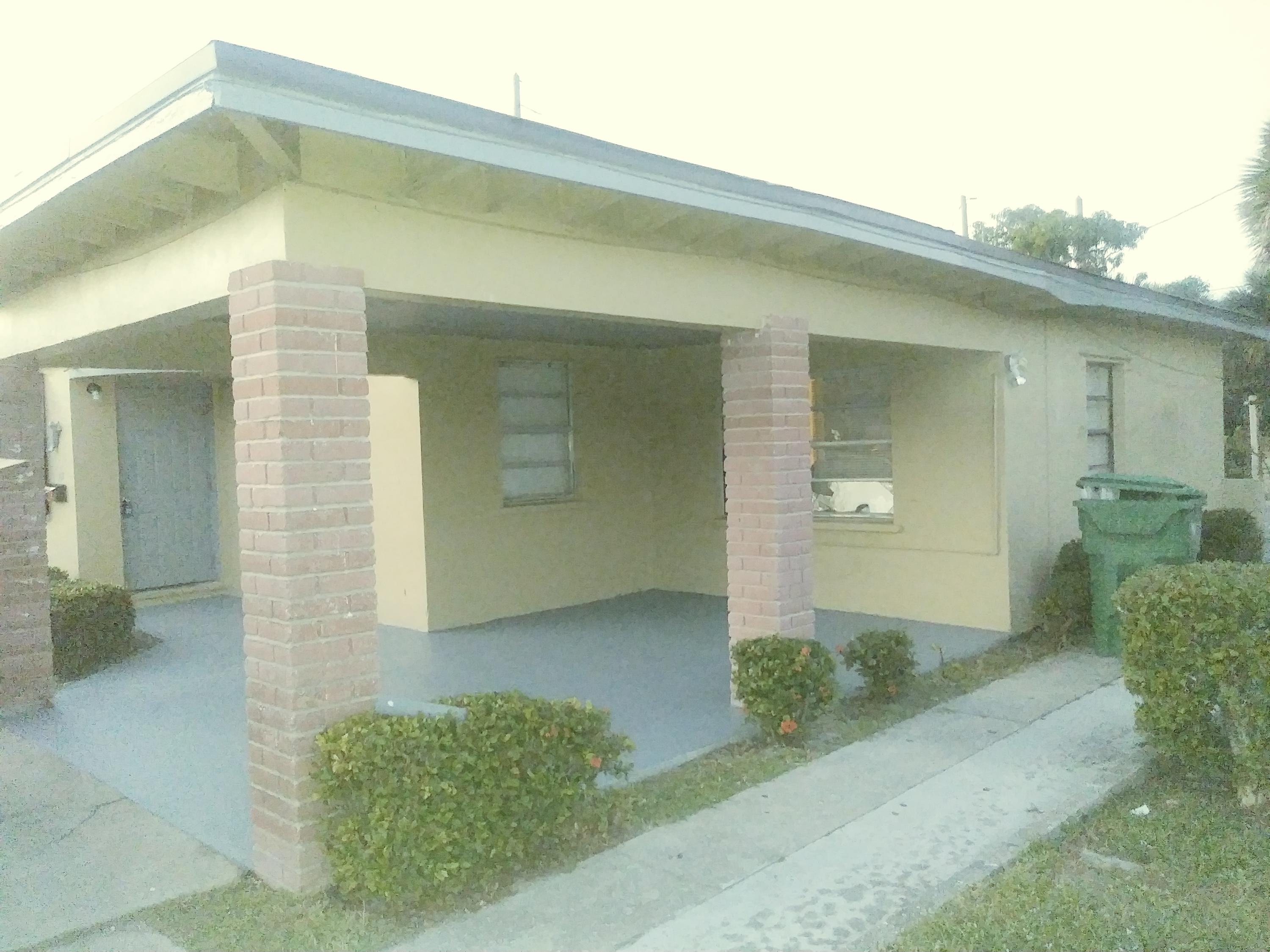 168 West 13th Street Riviera Beach, FL 33404 - Photo 2 of 6 168 carport