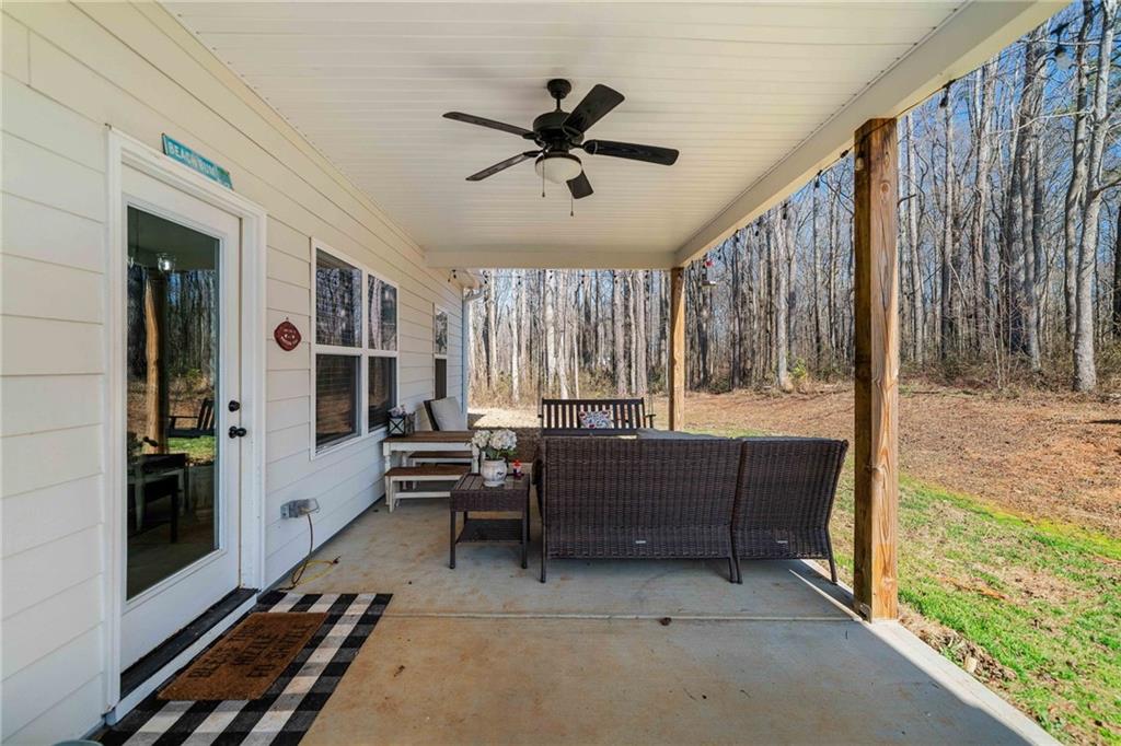 104 Federal Path Temple, GA 30179 - Photo 25 of 32 a living room with furniture and a window