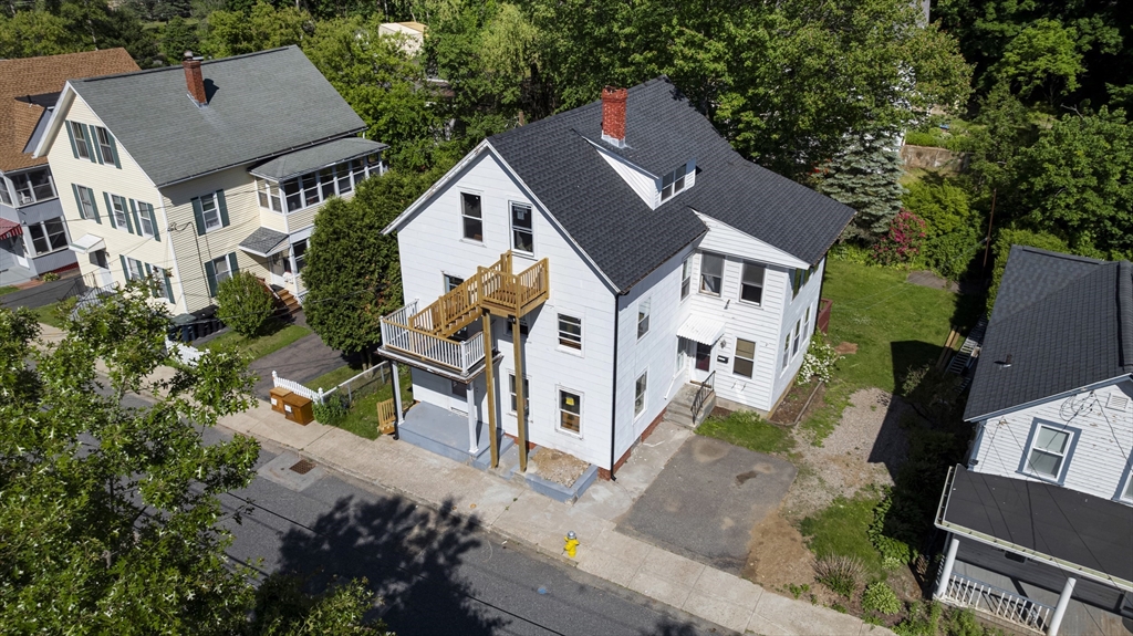 47 Morris Street Southbridge, MA 01550 - Photo 1 of 40 an aerial view of a house with a yard