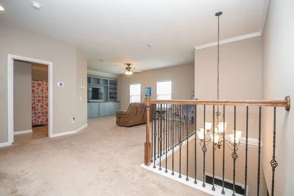 a view of hallway with stairs