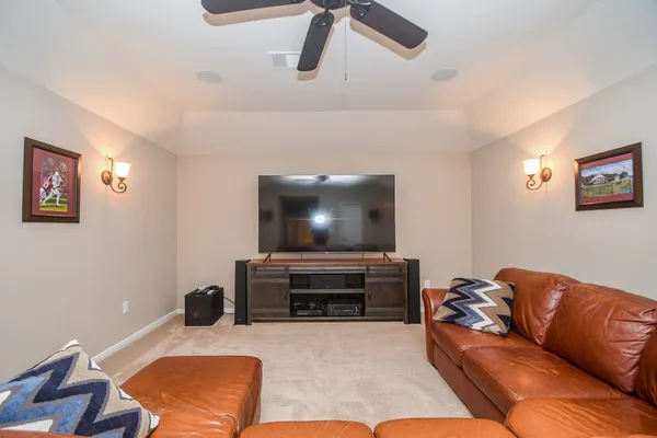 a living room with furniture and window