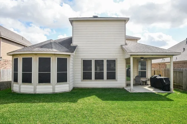 a view of living room and patio