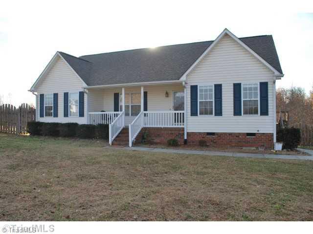 8067 Pritchett Road Browns Summit, NC 27214 - Photo 1 of 16 Exterior Front.