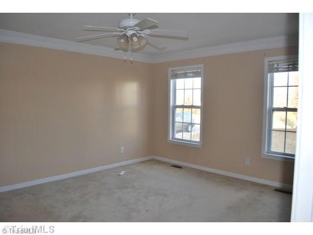 8067 Pritchett Road Browns Summit, NC 27214 - Photo 9 of 16 Master Bedroom.