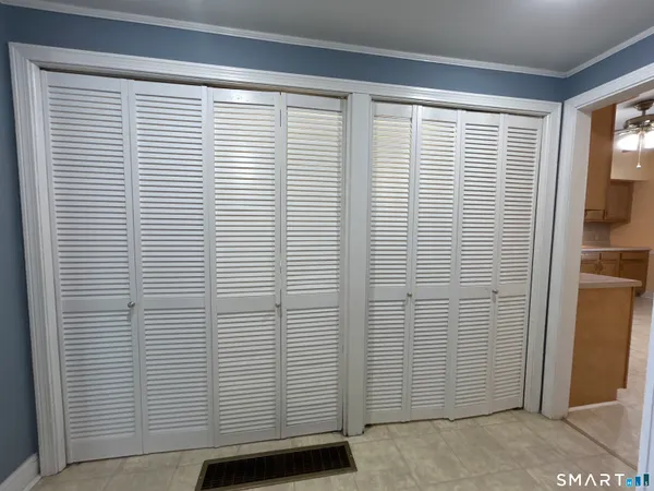 a view of a room with a window