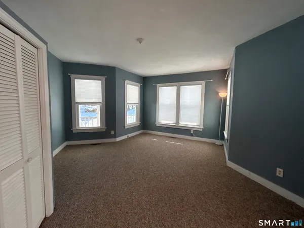 an empty room with windows