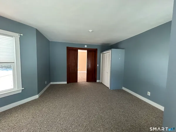 an empty room with windows