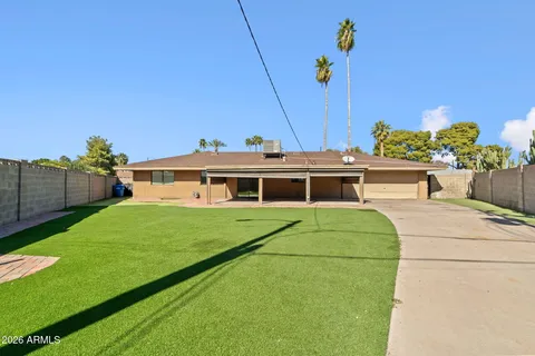 a view of a house with a big yard