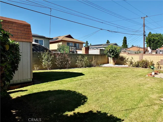 a view of an empty room with a fireplace