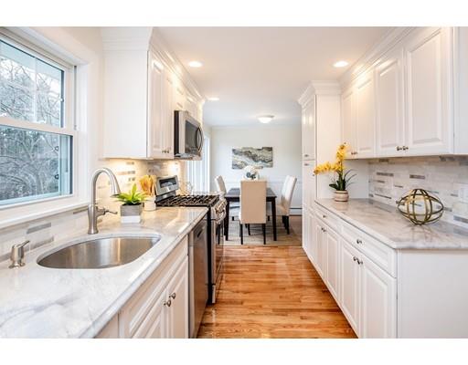 41 Fox Run Road Hamilton, MA 01982 - Photo 5 of 30 a kitchen with stainless steel appliances granite countertop a sink and a white cabinets