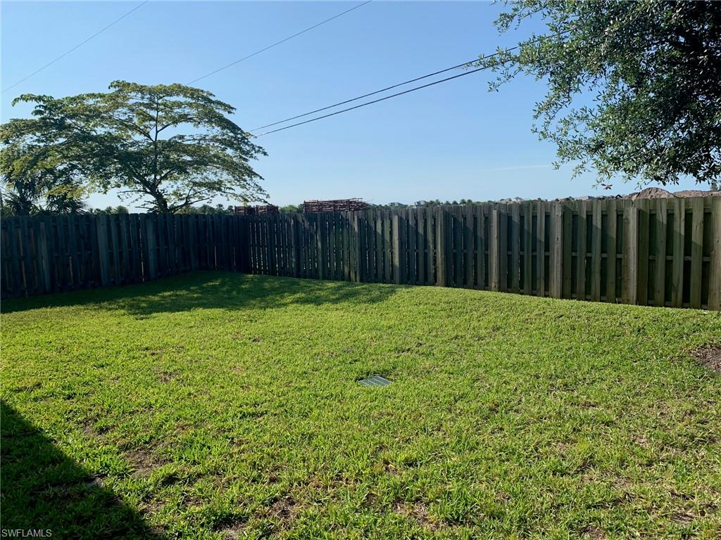 3128 Woodside Avenue Naples, FL 34112 - Photo 16 of 16 a view of a backyard