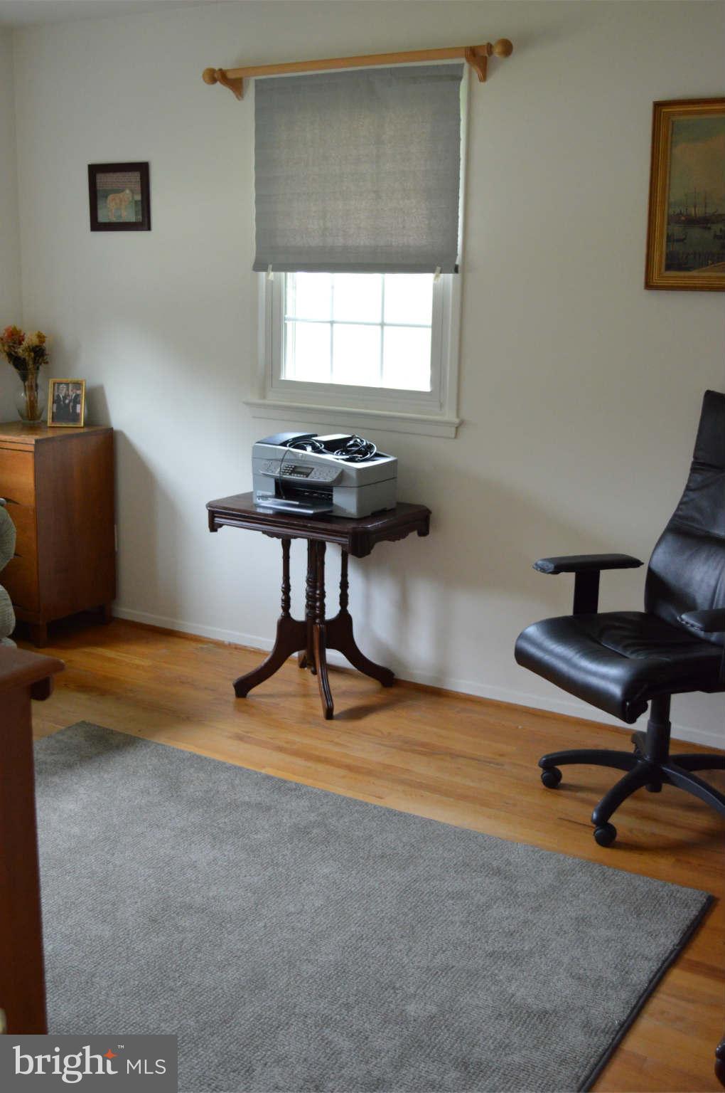 5916 Atteentee Road Springfield, VA 22150 - Photo 13 of 24 a room with furniture and a window