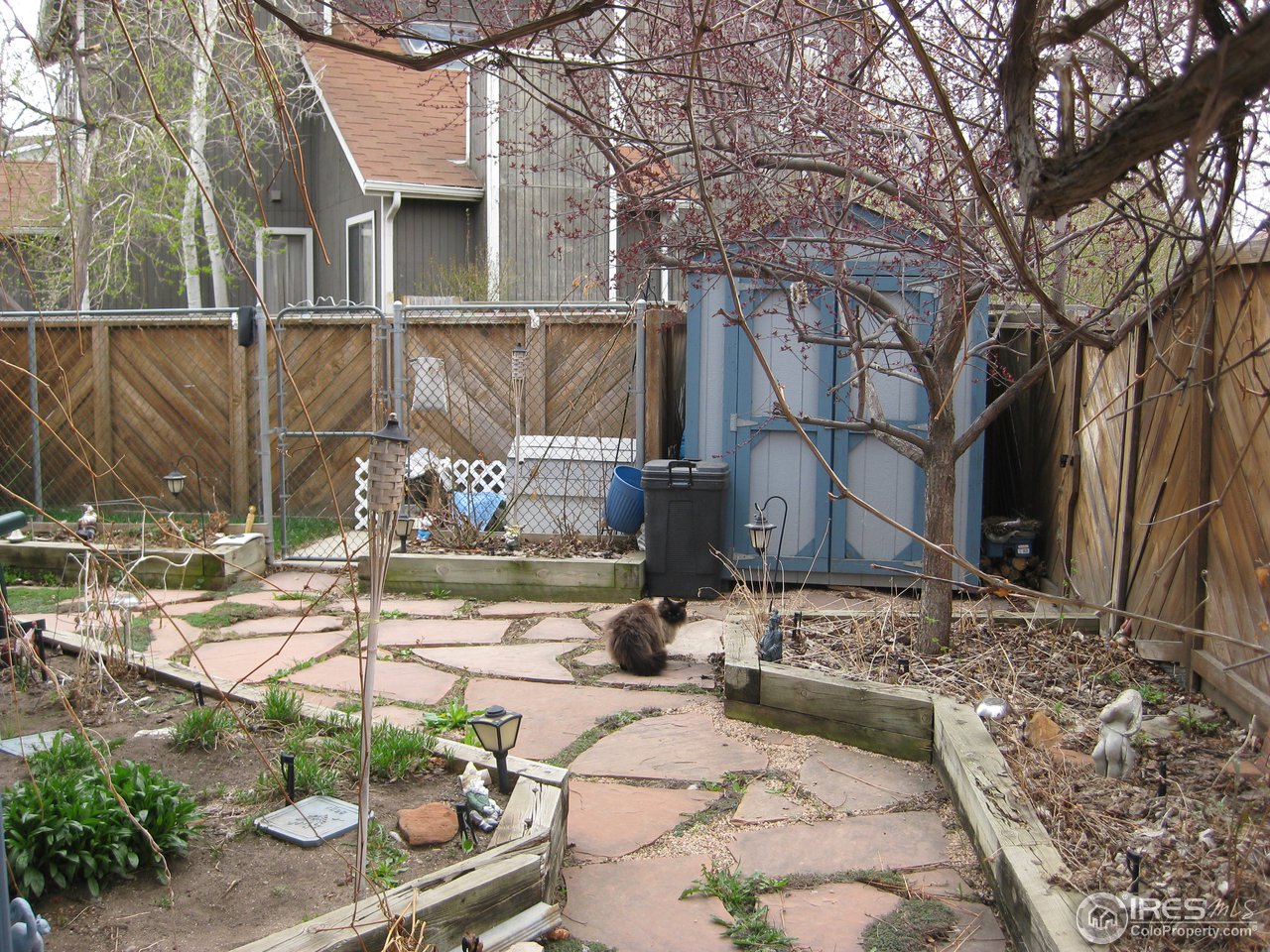 6616 Kalua Road Boulder, CO 80301 - Photo 11 of 18 a view of a house with backyard