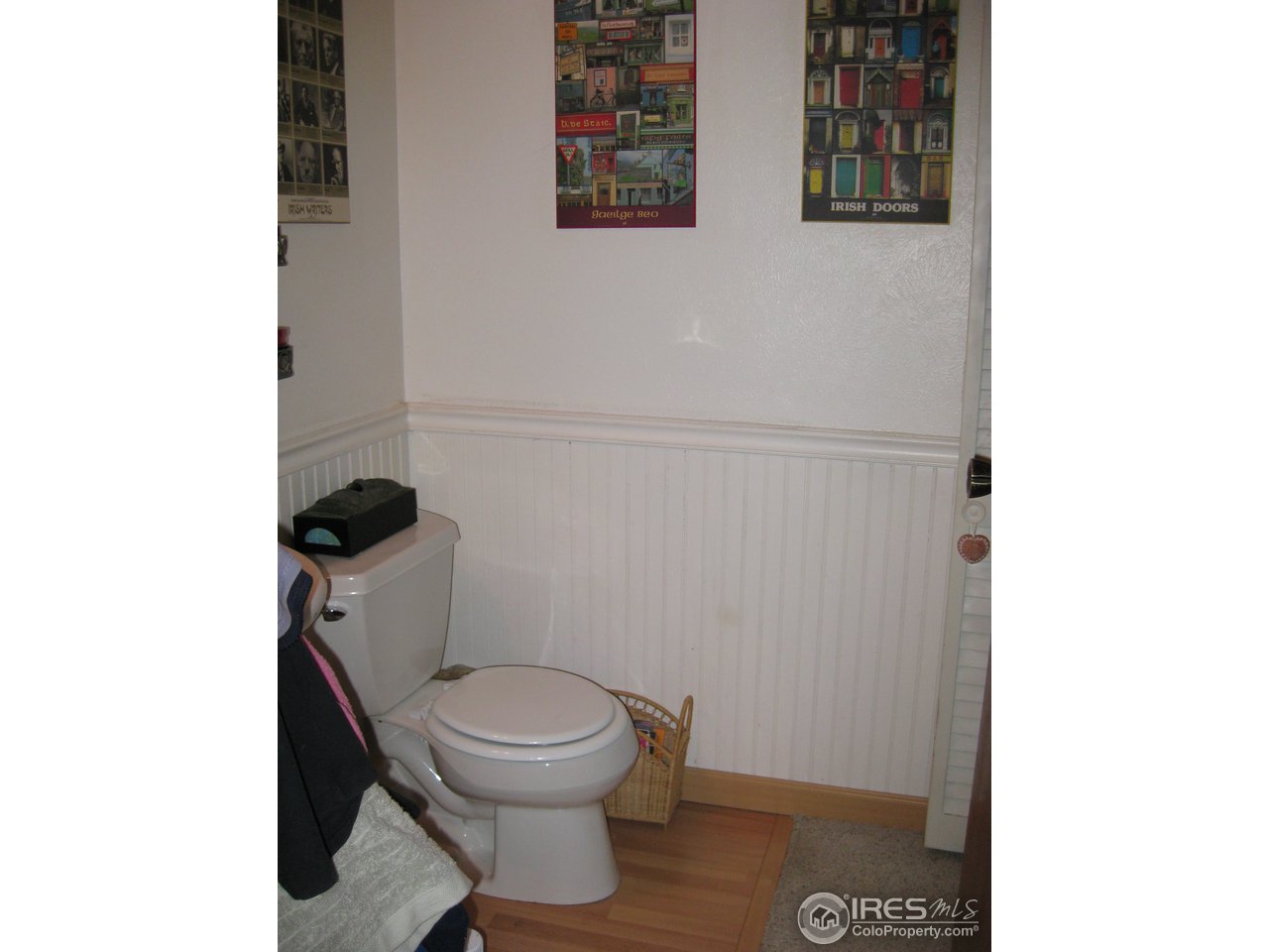 6616 Kalua Road Boulder, CO 80301 - Photo 5 of 18 a white toilet sitting next to a shower