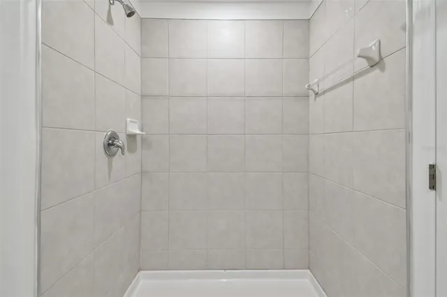 an aerial view of a house with a swimming pool