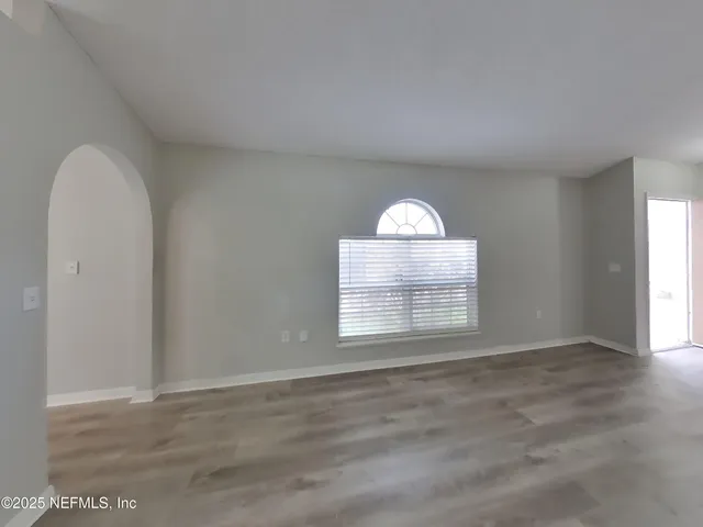 an empty room with windows
