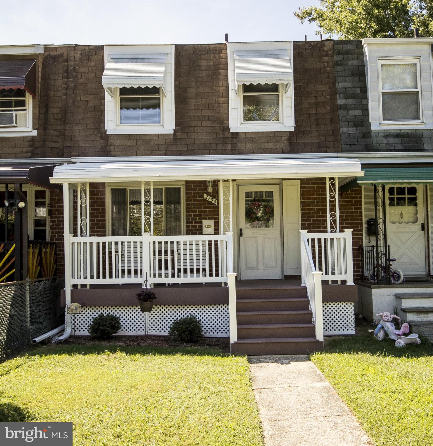 2136 Cockspur Road Baltimore, MD 21220 - Photo 1 of 20 a view of a house with wooden floor and a yard