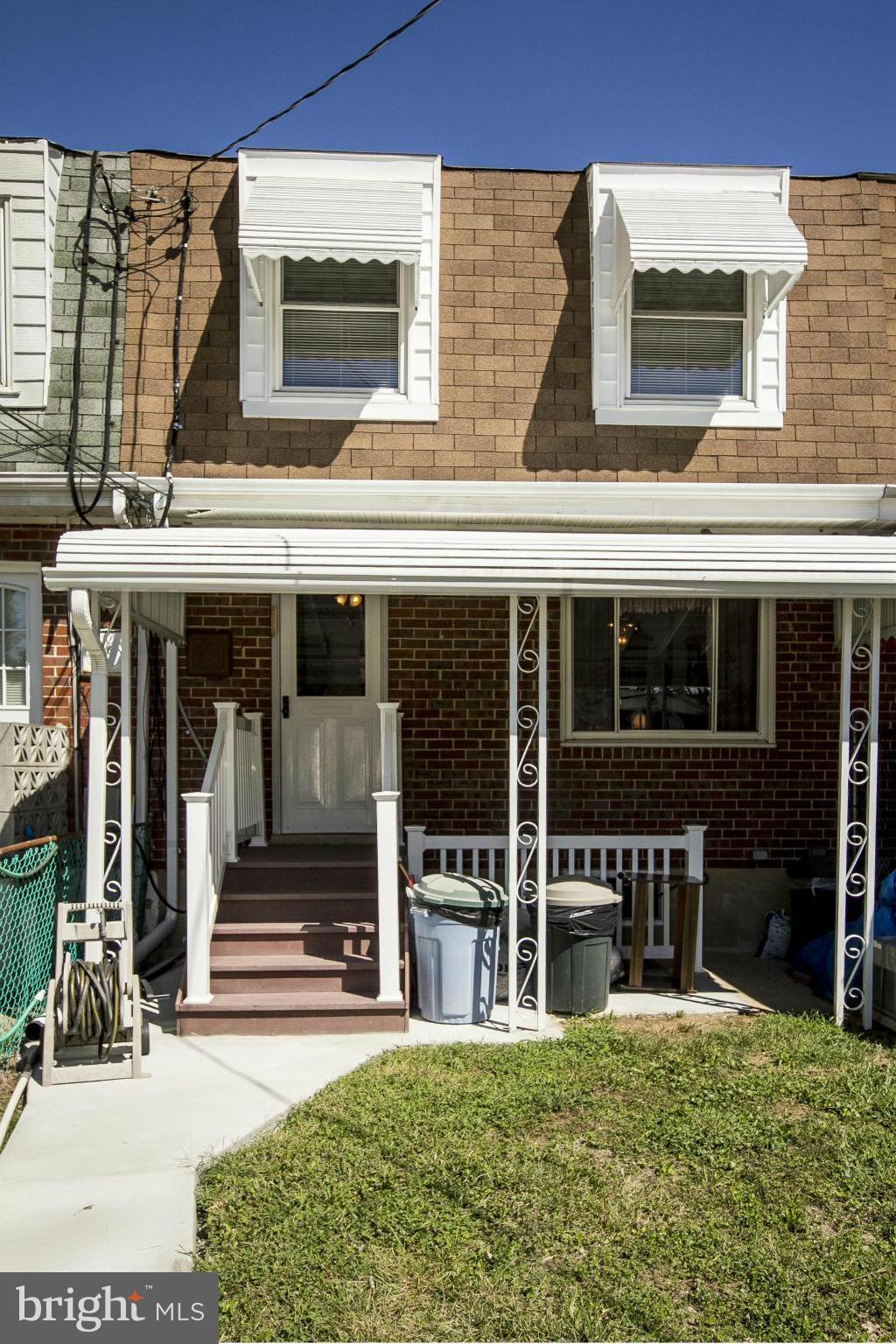 2136 Cockspur Road Baltimore, MD 21220 - Photo 18 of 20 front view of a building with a porch