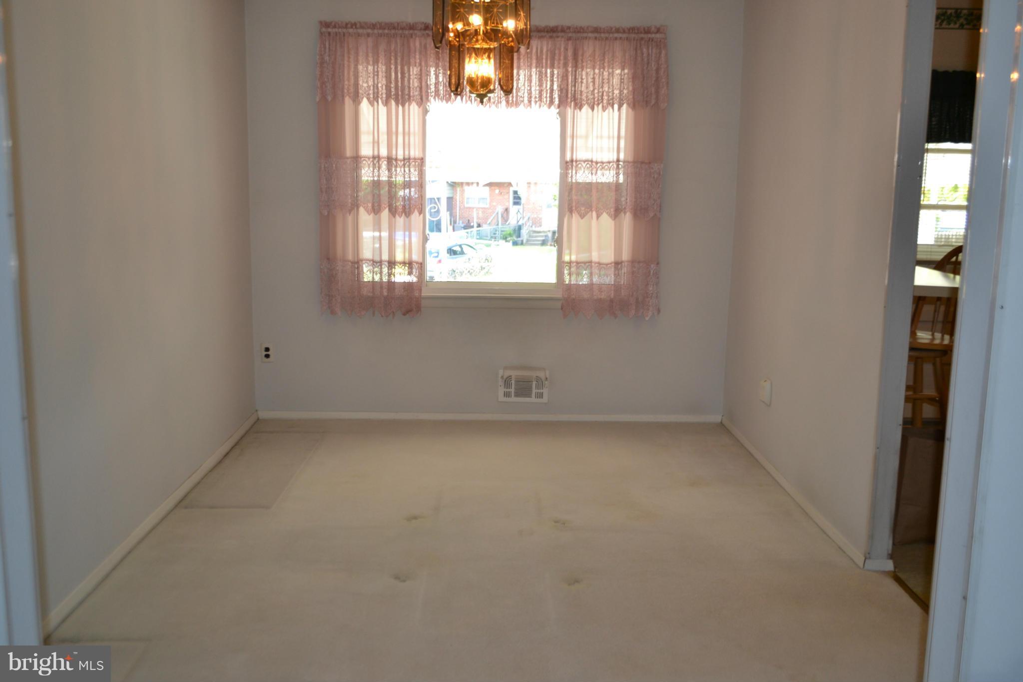 2136 Cockspur Road Baltimore, MD 21220 - Photo 4 of 20 an empty room with a window