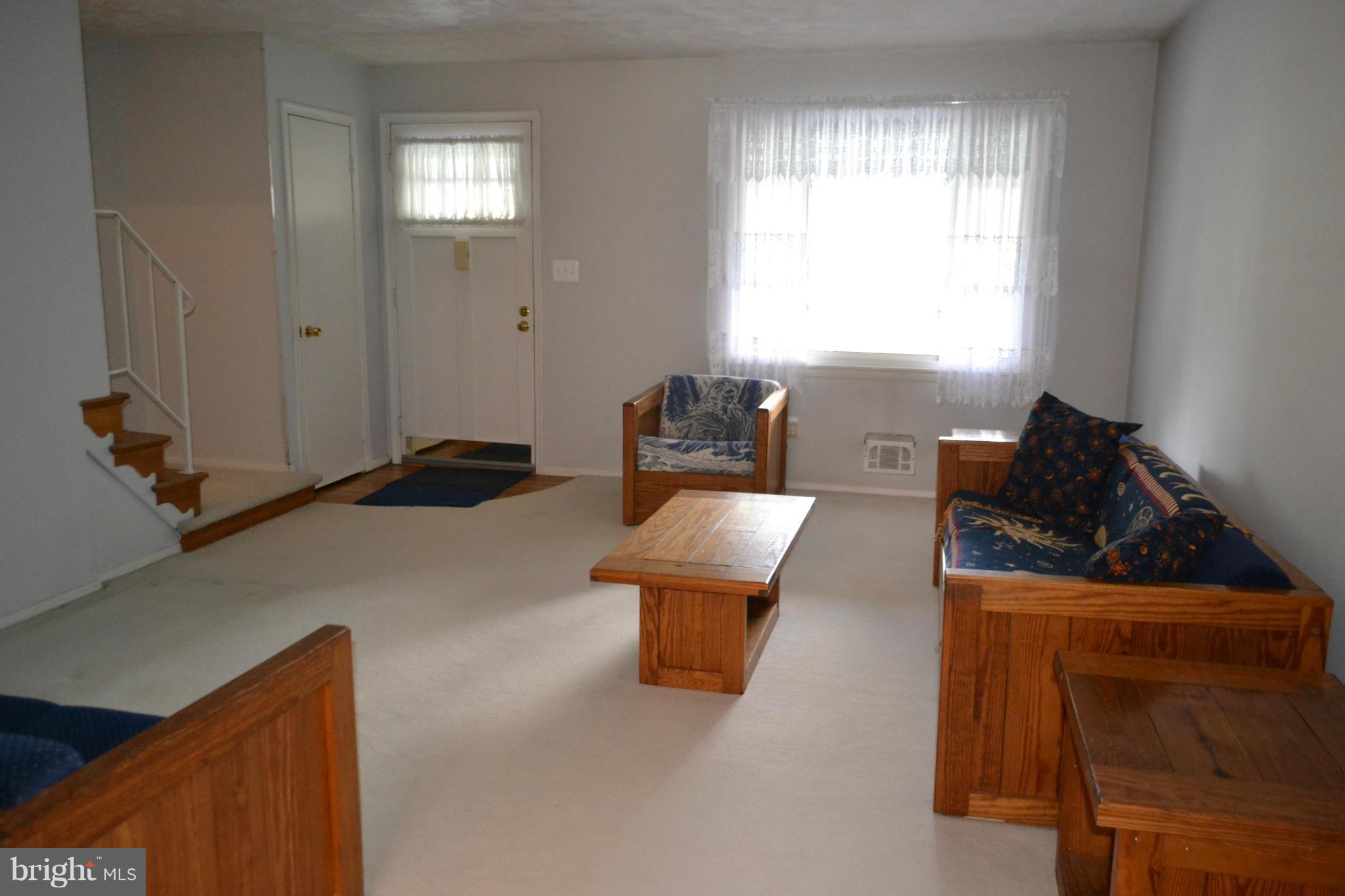 2136 Cockspur Road Baltimore, MD 21220 - Photo 5 of 20 a living room with furniture and a window