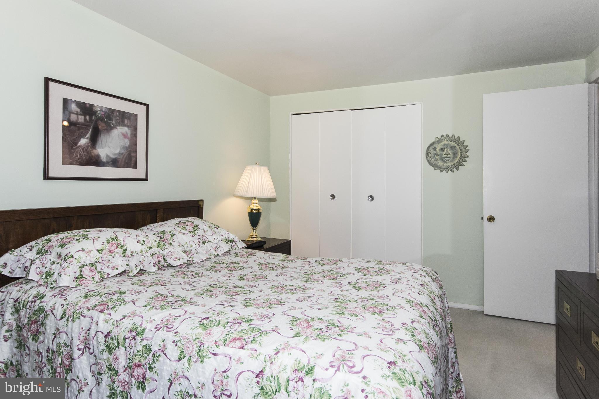 2136 Cockspur Road Baltimore, MD 21220 - Photo 8 of 20 a bedroom with a bed and a window