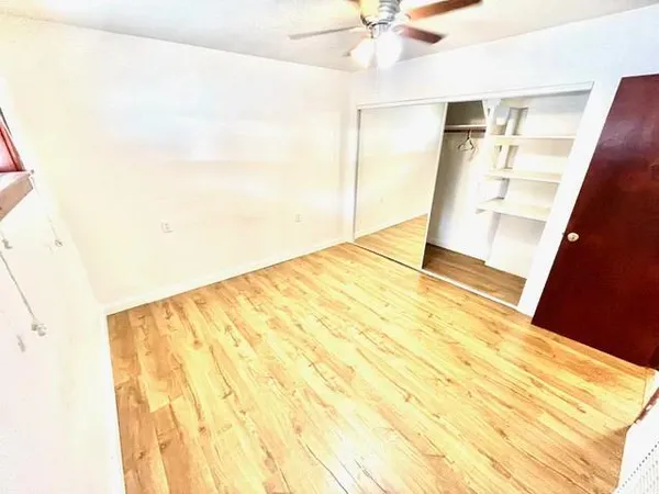 a bathroom with a sink a mirror and a toilet
